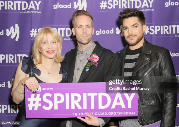 Courtney Love, Justin Tranter and Adam Lambert attend the 'Believer' Spirit Day Concert presented by Justin Tranter and GLAAD at Sayer's Club on...