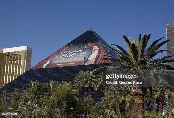 Large billboard promoting the "Criss Angel Cirque du Soleil" show is seen on the side of the Luxor Hotel pyramid in this street level 2009 Las Vegas,...