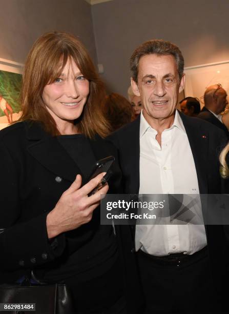 Carla Bruni and Nicolas Sarkozy attend the Simon Bocanegra And Philippe Morillon : Exhibition At la Galerie Du Passage Pierre Passebon on October 18,...