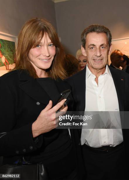 Carla Bruni and Nicolas Sarkozy attend the Simon Bocanegra And Philippe Morillon : Exhibition At la Galerie Du Passage Pierre Passebon on October 18,...