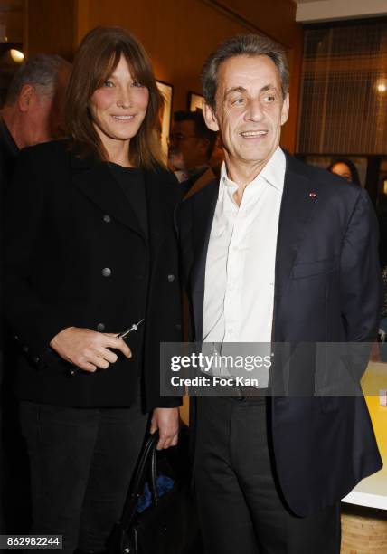 Carla Bruni and Nicolas Sarkozy attend the Simon Bocanegra And Philippe Morillon : Exhibition At la Galerie Du Passage Pierre Passebon on October 18,...