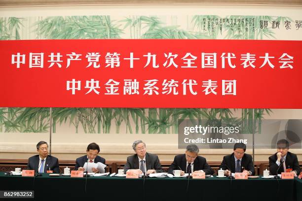 Yi Gang, deputy governor of the People's Bank of China, Liu Shiyu, chairman of the China Securities Regulatory Commission, Zhou Xiaochuan, governor...