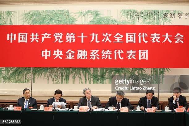 Yi Gang, deputy governor of the People's Bank of China, Liu Shiyu, chairman of the China Securities Regulatory Commission, Zhou Xiaochuan, governor...