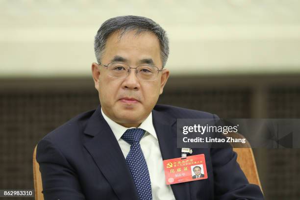 Hu Chunhua, Secretary of the CPC Guangdong Provincial Committee, attends a meeting of the 19th Communist Party Congress at the Great Hall of the...