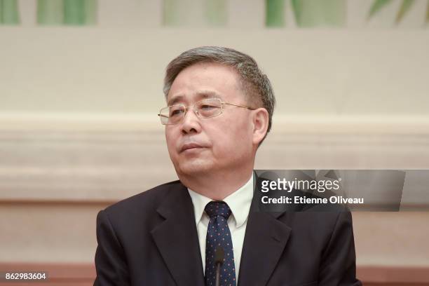Chairman of the China Banking Regulatory Commission Guo Shuqing attends a news conference at The Great Hall Of The People on October 19, 2017 in...