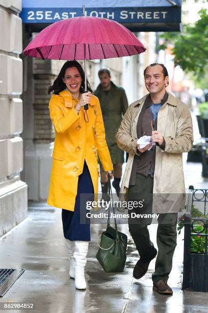 Rebecca Hall and Jude Law seen on location for Woody Allen's untitled movie on October 18, 2017 in New York City.