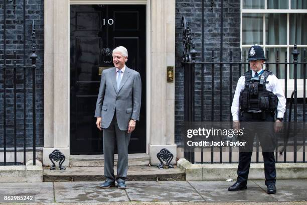 Former US President Bill Clinton leaves Number 10 Downing Street on October 19, 2017 in London, England. Mr Clinton met with British Prime Minister...