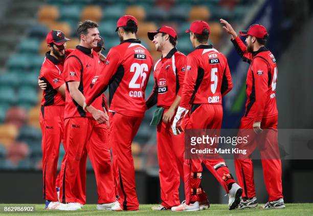Daniel Worrall of the Redbacks celebrates with team mates after taking the wicket of Dan Christian of the Bushrangers during the JLT One Day Cup...