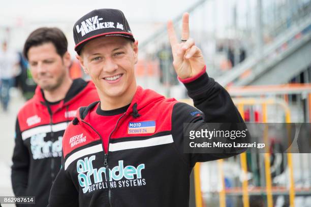 Dominique Aegerter of Switzerland and Kiefer Racing greets in paddock during previews ahead of the 2017 MotoGP of Australia at Phillip Island Grand...
