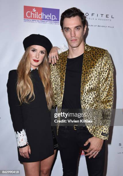 Shenae Grimes and Josh Beech attend Childhelp Hollywood Heroes on October 18, 2017 in Beverly Hills, California.