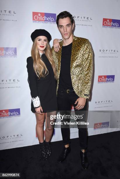 Shenae Grimes and Josh Beech attend Childhelp Hollywood Heroes on October 18, 2017 in Beverly Hills, California.