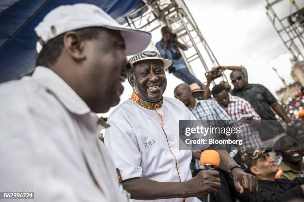 Musalia Mudavadi, principal of the National Super Alliance , left, speaks with Raila Odinga, opposition leader for the National Super Alliance ,...