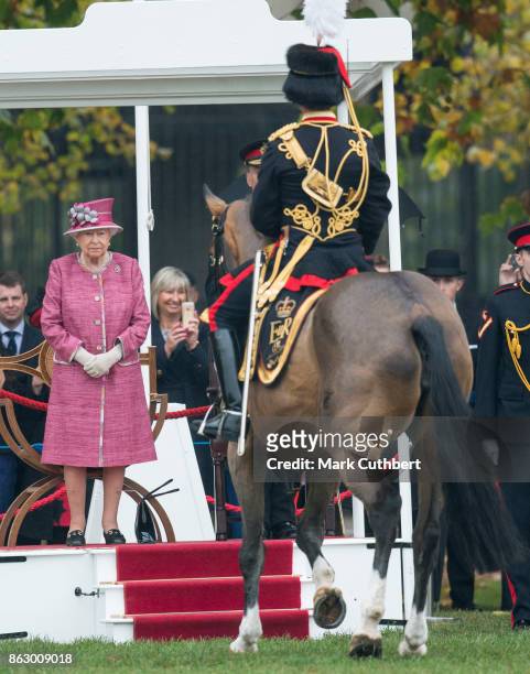 Queen Elizabeth II reviews The King's Troop Royal Horse Artillery on the 70th anniversary at Hyde Park on October 19, 2017 in London, England. The...