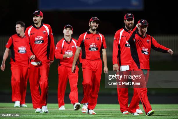 Cameron Valente of the Redbacks celebrates victory with team mates during the JLT One Day Cup match between South Australia and Victoria at...