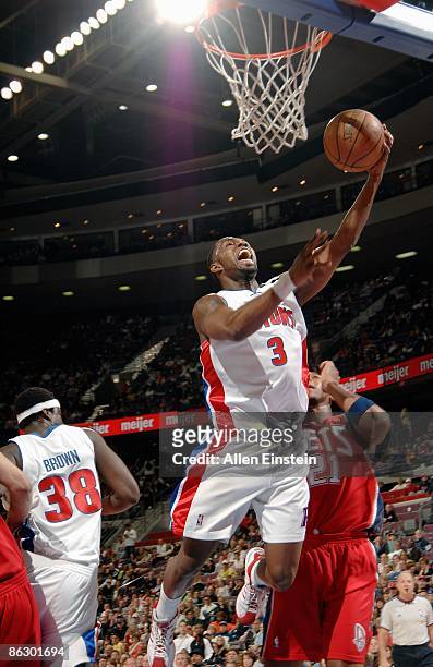 Rodney Stuckey of the Detroit Pistons lays up a shot against Bobby Simmons of the New Jersey Nets during the game on April 10, 2009 at The Palace of...