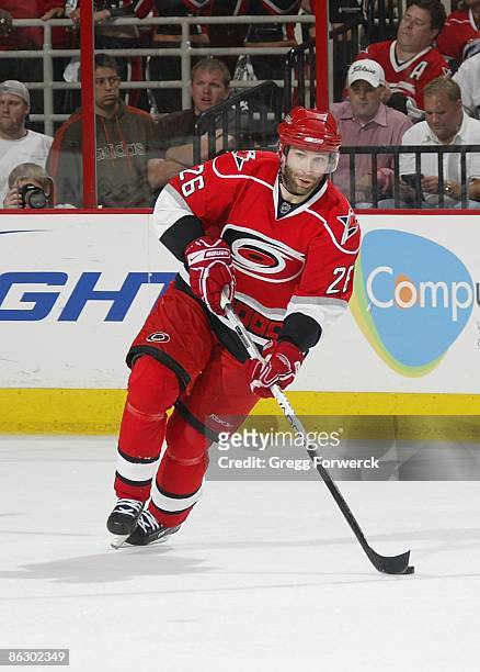 Erik Cole of the Carolina Hurricanes looks to pass the puck during Game Six of the Eastern Conference Quarterfinal Round of the 2009 Stanley Cup...
