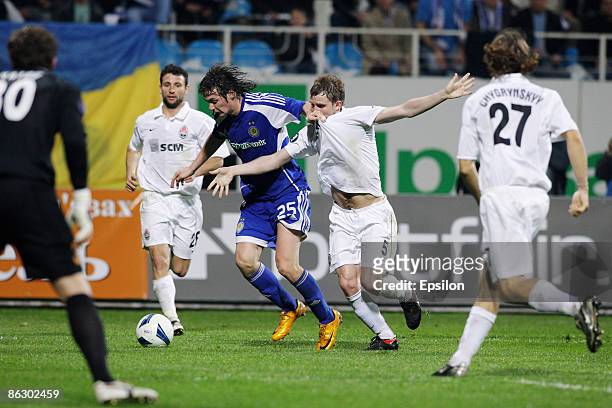 Artem Milevskiy of FC Dynamo Kiev battles for the ball with Olexandr Kucher of FC Shakhtar Donetsk during the UEFA Cup semi-finals first leg match...