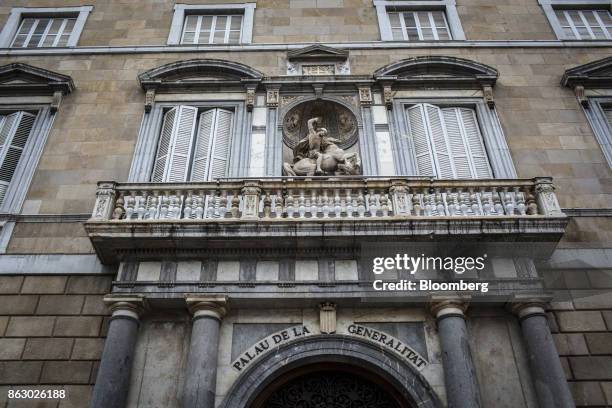 Statue sits above the entrance to the Generalitat regional government offices on Sant Jaume square in Barcelona, Spain, on Thursday, Oct. 19, 2017....