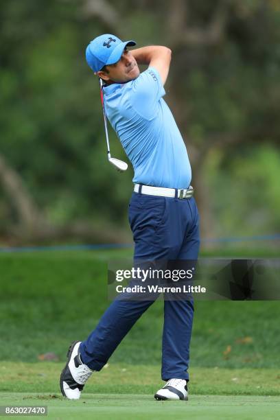 Felipe Aguilar of Chile hits his second shot on the 18th hole during day one of the Andalucia Valderrama Masters at Real Club Valderrama on October...