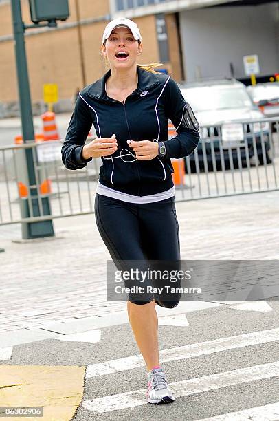 Actress Jessica Biel runs along the West Side Highway bike path on April 30, 2009 in New York City.