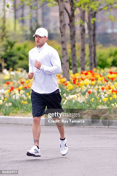 Singer and actor Justin Timberlake runs along the West Side Highway bike path on April 30, 2009 in New York City.