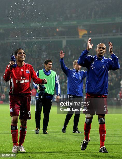 Paolo Guerrero of Hamburg celebrates with his team mate Alex Silva after winning the UEFA Cup Semi Final first leg match between SV Werder Bremen and...