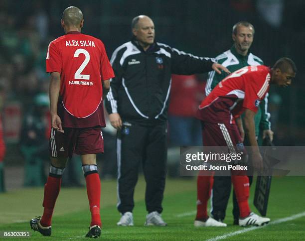 Alex Silva of Hamburg leaves the pitch and is replaced by Jerome Boateng during the UEFA Cup Semi Final first leg match between SV Werder Bremen and...