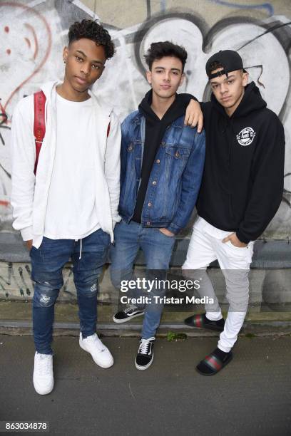 Teen stars and singer Devin Gordon, Daniel Veda and Kevin Alston of the band The Bomb Digz pose for pictures before their concert on October 19, 2017...
