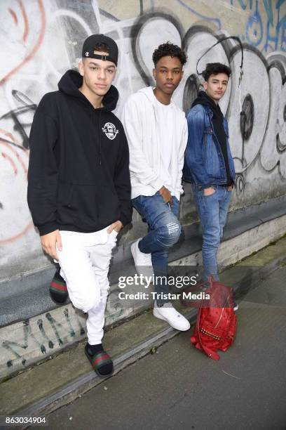 Teen stars and singer Devin Gordon, Daniel Veda, Kevin Alston of the band The Bomb Digz pose for pictures before their concert on October 19, 2017 in...