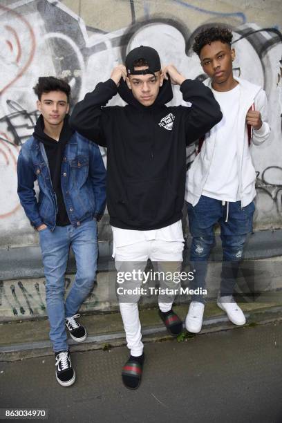 Teen stars and singer Devin Gordon, Daniel Veda and Kevin Alston of the band The Bomb Digz pose for pictures before their concert on October 19, 2017...