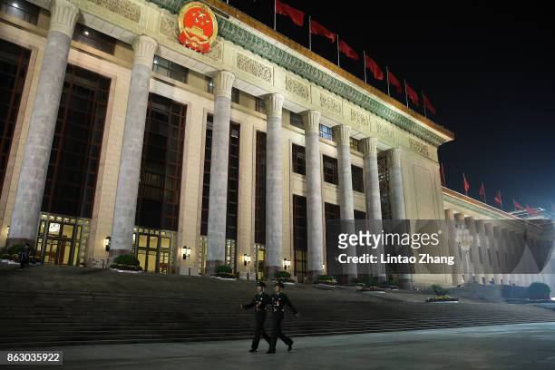 Armed policemen patrol at front of the Great Hall of the People on October 19, 2017 in Beijing, China. The 19th CPC National Congress is going to run...