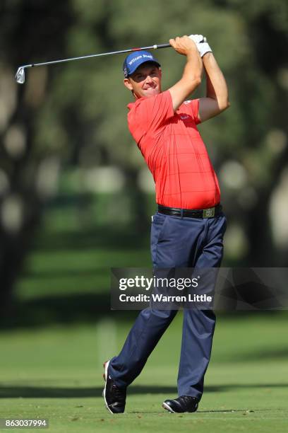 Padraig Harrington of Ireland hits his second shot on the 7th hole during day one of the Andalucia Valderrama Masters at Real Club Valderrama on...