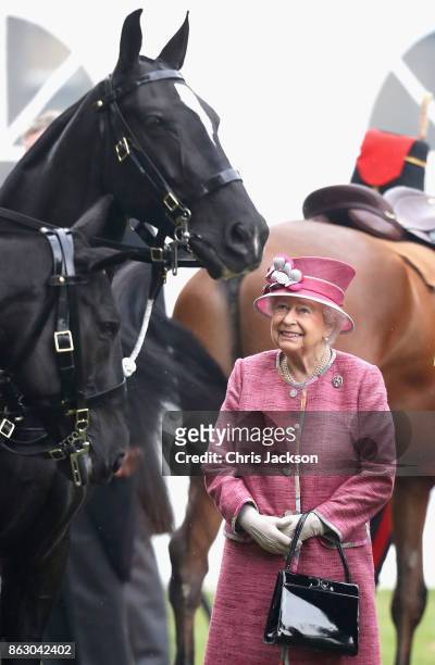 The Queen reviews The King's Troop Royal Horse Artillery on the 70th anniversary at Hyde Park on October 19, 2017 in London, England. The KTRHA was...