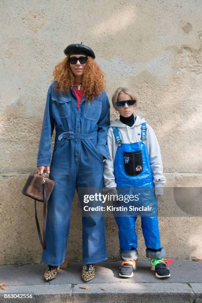 Jewellery designer Natasha Zinko wears a Dior jumpsuit and shoes, Celine sunglasses and Natasha Zinko bag and jewellery with Ivan Zinko wears a DIY...