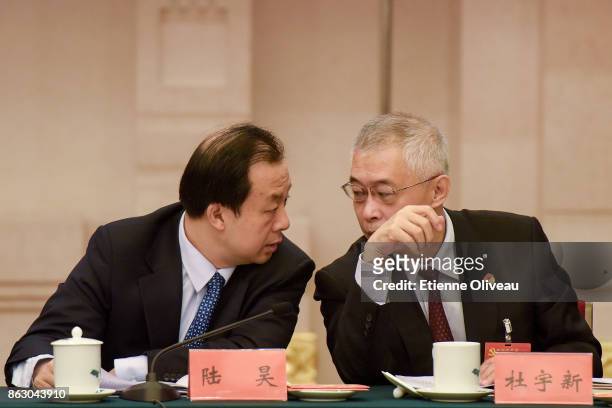 Governor of Heilongjiang Province and deputy secretary of the Heilongjiang CPC Provincial Committee Lu Hao talks with Chairman of Heilongjiang CPPCC...