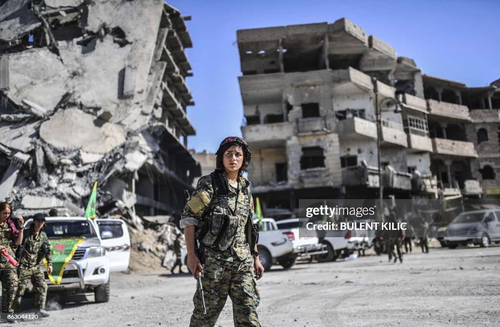 TOPSHOT-SYRIA-RAQA-CONFLICT