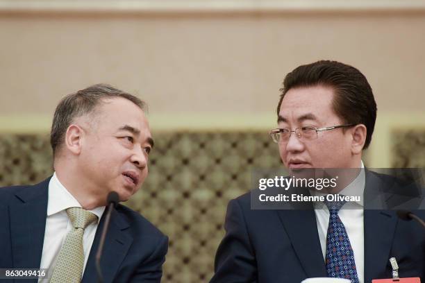 Deputy Secretary of the Sichuan CPC Provincial Committee Deng Xiaogang talks with a Member of the Standing Committee of Sichuan Province Fan Ruiping...