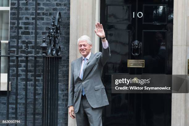 Former US President Bill Clinton leaves 10 Downing Street in central London following talks with British Prime Minister Theresa May on political...