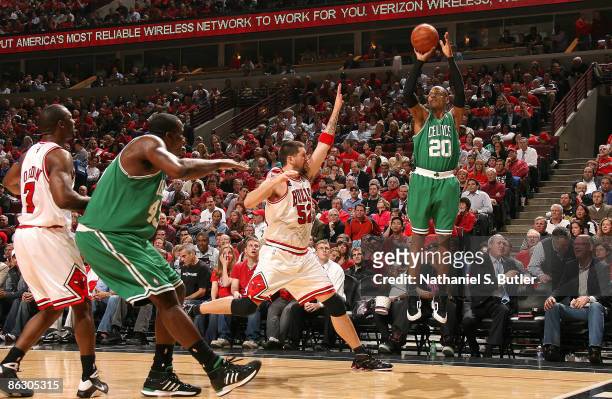 Ray Allen of the Boston Celtics puts up a shot over Brad Miller of the Chicago Bulls during Game Six of the Eastern Conference Quarterfinals as part...