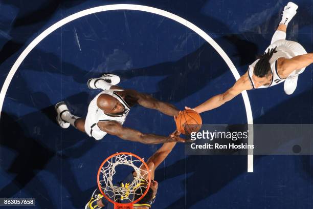 Quincy Acy and Jeremy Lin of the Brooklyn Nets grabs the rebound against the Indiana Pacers on October 18, 2017 at Bankers Life Fieldhouse in...