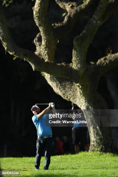 Andy Sullivan of England hits his second shot on the 18th hole during day one of the Andalucia Valderrama Masters at Real Club Valderrama on October...