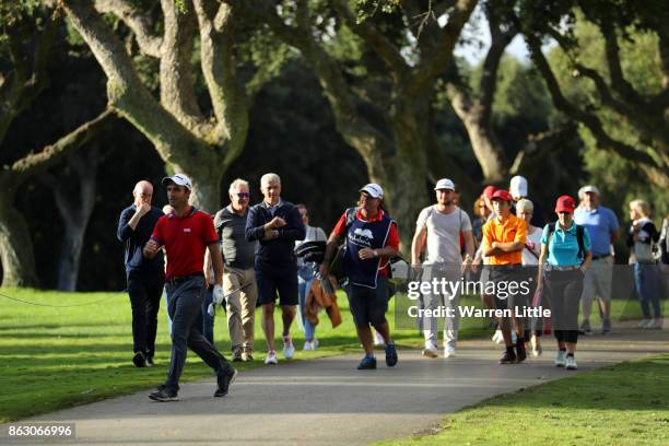 Edoardo Molinari of Italy hits his second shot on the 18th hole during day one of the Andalucia Valderrama Masters at Real Club Valderrama on October...