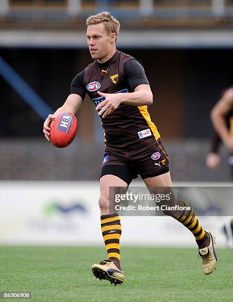 Sam Mitchell of the Hawks kicks the ball during a Hawthorn Hawks AFL training session at Waverley Park on May 1, 2009 in Melbourne, Australia.