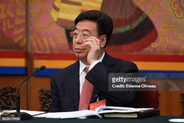 Secretary of the Tibet CPC Autonomous Regional Committee Wu Yingjie attends a meeting of the 19th Communist Party Congress at the Great Hall of the...