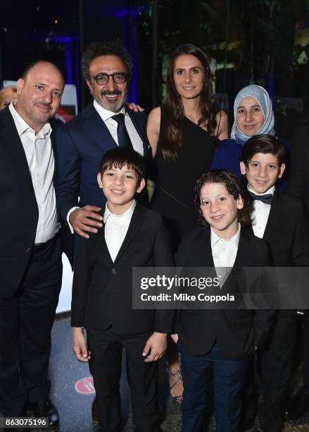 Chobani Founder and CEO Hamdi Ulukaya and Louise Vongerichten and Syrian Refugees and Save the Children beneficiaries Faiqa Aloqla, Ezaat Aloqla,...