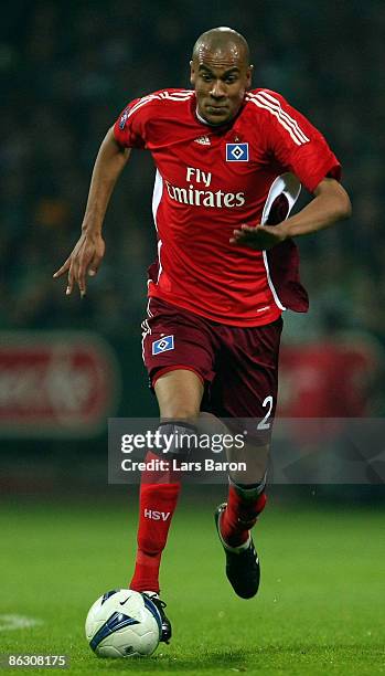 Alex Silva of Hamburg runs with the ball during the UEFA Cup Semi Final first leg match between SV Werder Bremen and Hamburger SV at the Weser...