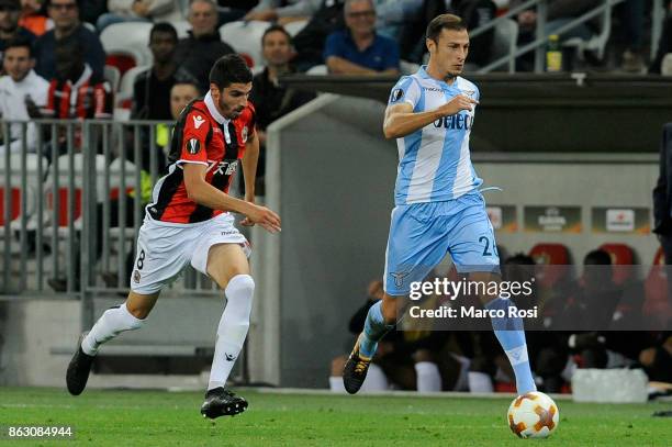 Senad Lulic of SS Lazio compete for the ball with Lees-Welou Pierre of OGC Nice during the UEFA Europa League group K match between OGC Nice and...