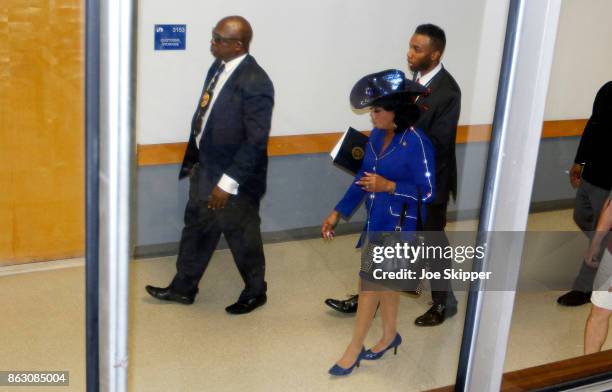 Rep. Frederica Wilson walks with security as she enters a Congressional field hearing on nursing home preparedness and disaster response October 19,...