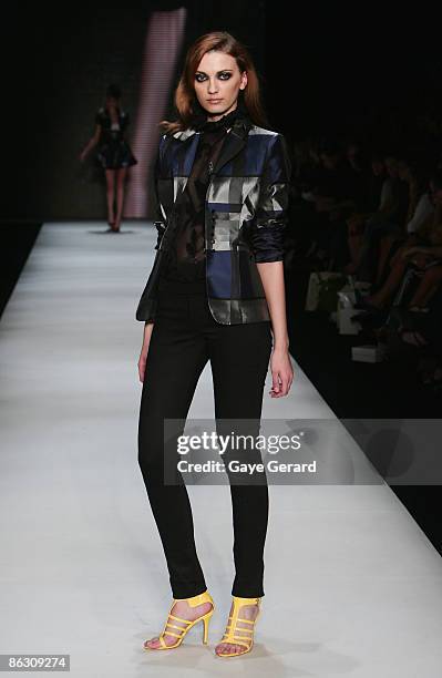 Model showcases designs by label By Weave at the New Generation V Australia catwalk show at the Overseas Passenger Terminal, Circular Quay on day...