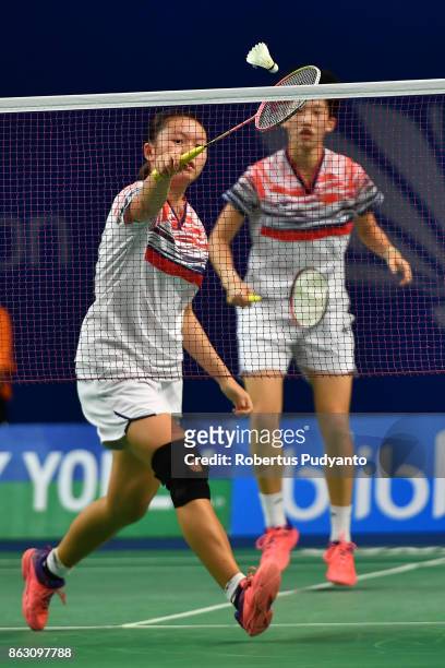 Yuting Xia and Zhang Shuxian of China compete against Tan Pearly Koong Le and Toh Ee Wei of Malaysia during Women's Doubles Round 16 match of the BWF...